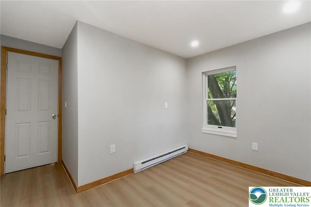 226 Fern St, Jim Thorpe Boro, PA 18229 - unfurnished room with a baseboard heating unit, light wood-style flooring, and recessed lighting