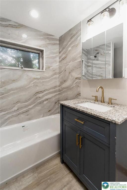 226 Fern St, Jim Thorpe Boro, PA 18229 - bathroom featuring vanity, wood finished floors, and shower / tub combination
