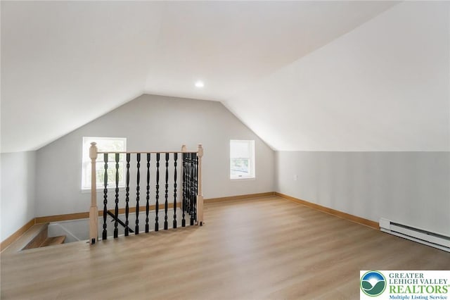 226 Fern St, Jim Thorpe Boro, PA 18229 - additional living space featuring a baseboard heating unit, wood finished floors, and lofted ceiling