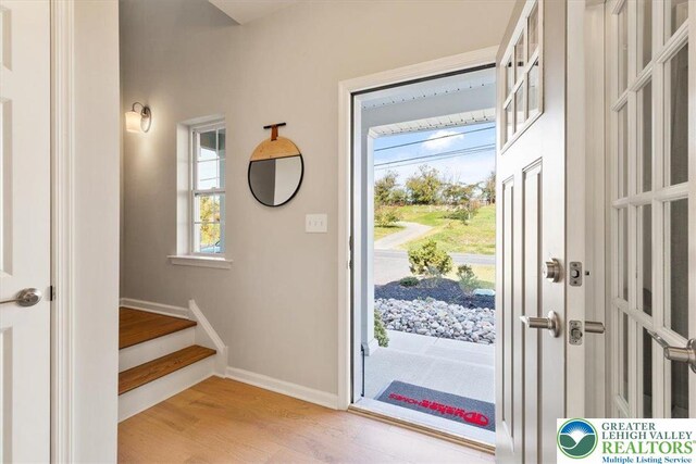 77 Tumble Creek Rd Unit 14, Williams Twp, PA 18042 - entrance foyer featuring wood finished floors and stairs