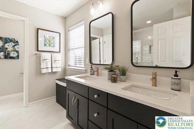 77 Tumble Creek Rd Unit 14, Williams Twp, PA 18042 - bathroom with double vanity and marble finish flooring