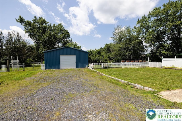 4220 Bethlehem Pike, Hilltown Twp, PA 18969 - view of yard featuring an outbuilding, a detached garage, and driveway