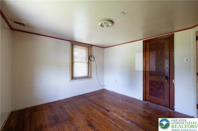 4220 Bethlehem Pike, Hilltown Twp, PA 18969 - spare room featuring hardwood / wood-style floors and ornamental molding