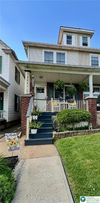 2031 Washington Blvd, Wilson Boro, PA 18042 - traditional style home with brick siding and covered porch