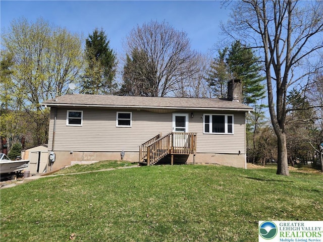 1007 Calypso, Wayne, PA 18436 - back of house featuring a chimney, a yard, and a storage unit