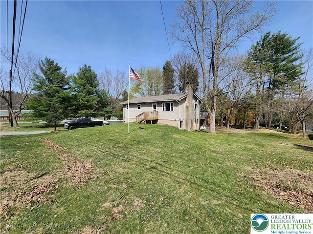 1007 Calypso, Wayne, PA 18436 - view of front of property featuring a front lawn and a chimney