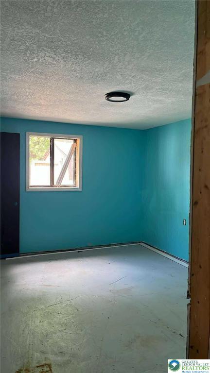 1007 Calypso, Wayne, PA 18436 - unfurnished room with a textured ceiling