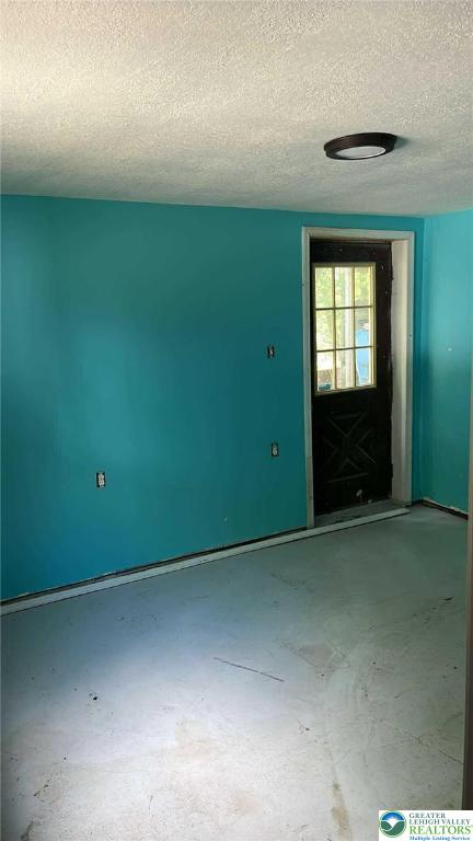 1007 Calypso, Wayne, PA 18436 - entrance foyer featuring a textured ceiling