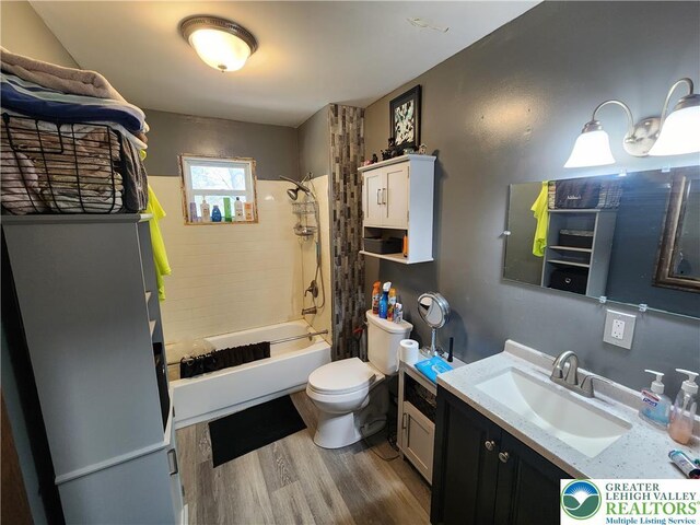 1007 Calypso, Wayne, PA 18436 - bathroom with vanity, tub / shower combination, and wood finished floors
