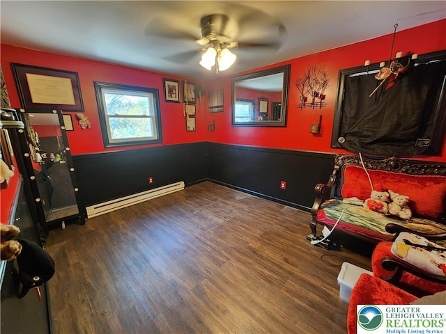 1007 Calypso, Wayne, PA 18436 - rec room with a baseboard radiator, wood finished floors, ceiling fan, and wainscoting