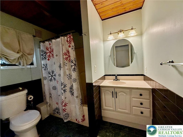 193 Canterbury Rd, Lehman Twp, PA 18324 - bathroom with vanity, shower / bath combo, wainscoting, and tile patterned flooring