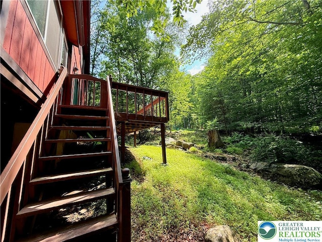 193 Canterbury Rd, Lehman Twp, PA 18324 - view of yard with stairs and a wooden deck