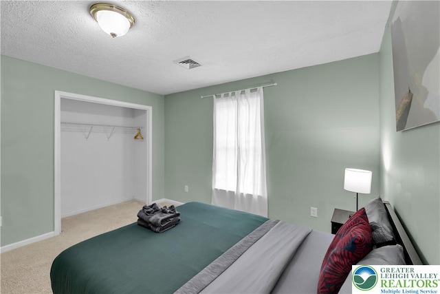 672 Clearview St, Tobyhanna Twp, PA 18334 - carpeted bedroom with a textured ceiling and a closet