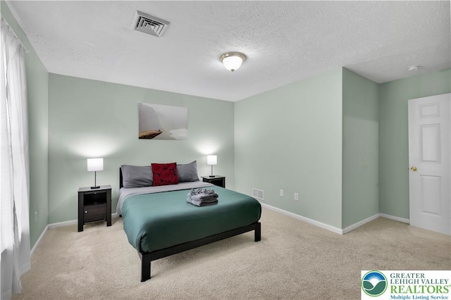 672 Clearview St, Tobyhanna Twp, PA 18334 - carpeted bedroom with baseboards and a textured ceiling