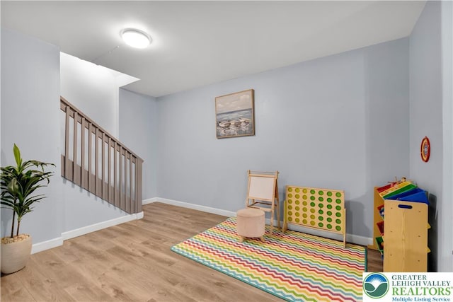 672 Clearview St, Tobyhanna Twp, PA 18334 - game room with wood finished floors and baseboards