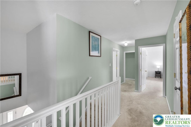 672 Clearview St, Tobyhanna Twp, PA 18334 - hall featuring an upstairs landing and light colored carpet