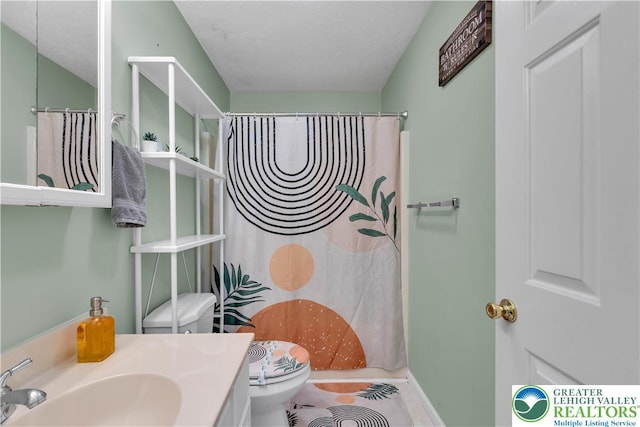 672 Clearview St, Tobyhanna Twp, PA 18334 - bathroom featuring a textured ceiling, vanity, curtained shower, and tile patterned flooring
