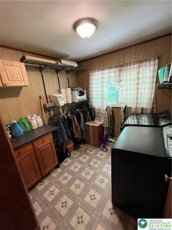 1321 Sheridan Rd, Lower Milford Twp, PA 18036 - interior space featuring wooden walls, brown cabinets, and dark countertops
