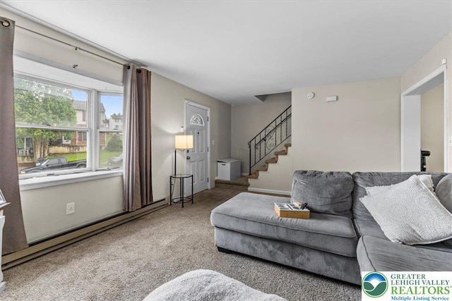 2233 Fox Run, Wilson Boro, PA 18042 - living area with carpet, stairway, and a baseboard radiator