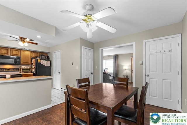 2233 Fox Run, Wilson Boro, PA 18042 - dining room featuring a ceiling fan, dark wood finished floors, recessed lighting, and a baseboard heating unit