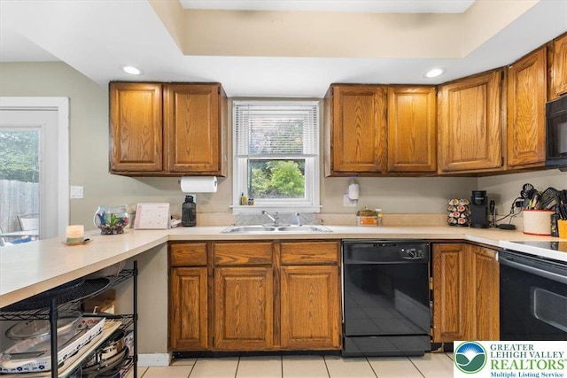 2233 Fox Run, Wilson Boro, PA 18042 - kitchen featuring black appliances, brown cabinetry, light countertops, and recessed lighting