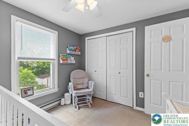 2233 Fox Run, Wilson Boro, PA 18042 - bedroom with baseboard heating, carpet floors, a closet, and ceiling fan