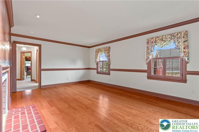 6513 Station Vw, Upper Milford Twp, PA 18092 - spare room featuring light wood-type flooring and crown molding