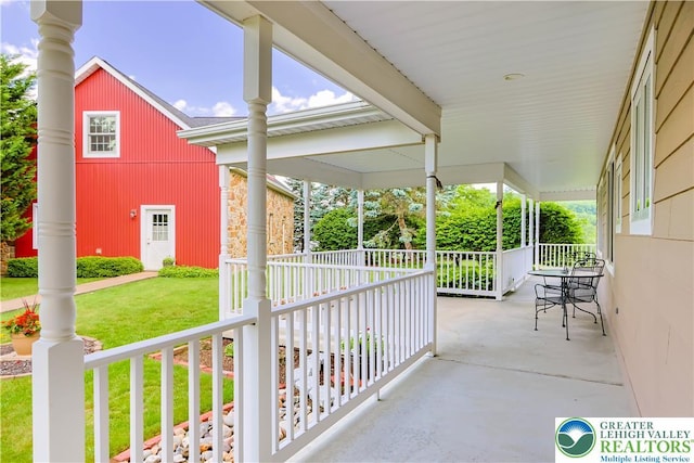 6513 Station Vw, Upper Milford Twp, PA 18092 - covered porch featuring a yard