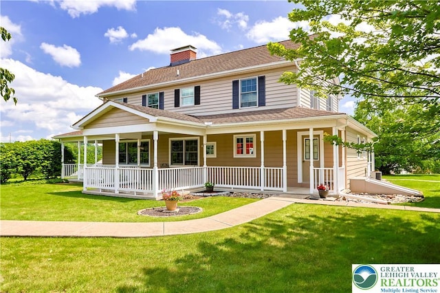 6513 Station Vw, Upper Milford Twp, PA 18092 - farmhouse-style home featuring a porch, a front yard, a chimney, and a shingled roof