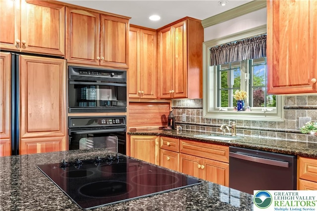 6513 Station Vw, Upper Milford Twp, PA 18092 - kitchen featuring dishwashing machine, black electric stovetop, dark stone counters, decorative backsplash, and recessed lighting