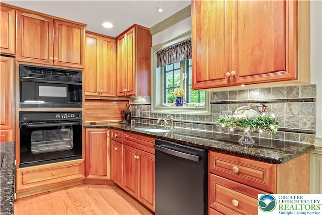 6513 Station Vw, Upper Milford Twp, PA 18092 - kitchen with dishwasher, dark stone countertops, backsplash, and recessed lighting