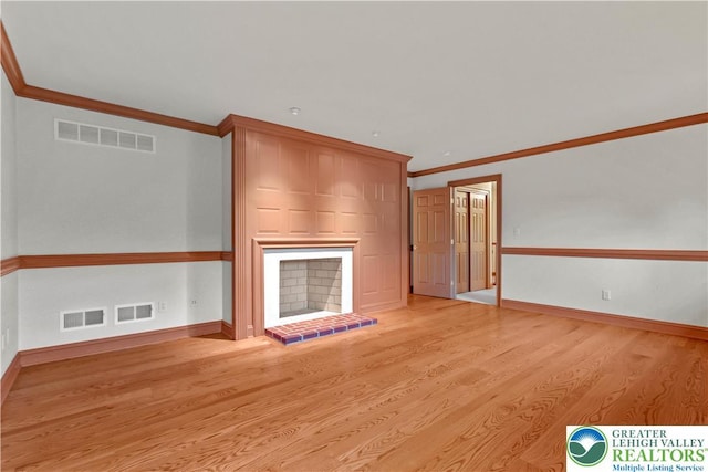 6513 Station Vw, Upper Milford Twp, PA 18092 - unfurnished living room with crown molding and light wood-type flooring