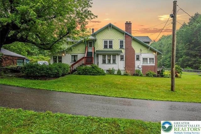 2834 Interchange Rd, Franklin Twp, PA 18235 - view of front of home featuring a chimney and a front yard