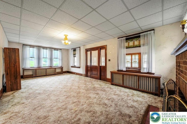 2834 Interchange Rd, Franklin Twp, PA 18235 - carpeted entryway with radiator heating unit and a paneled ceiling
