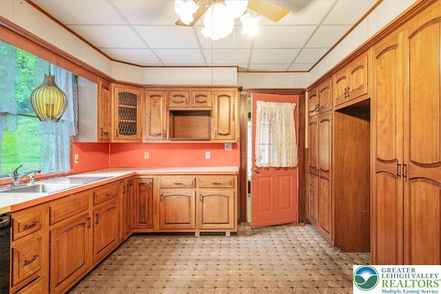 2834 Interchange Rd, Franklin Twp, PA 18235 - kitchen featuring brown cabinets, light floors, a drop ceiling, glass insert cabinets, and light countertops