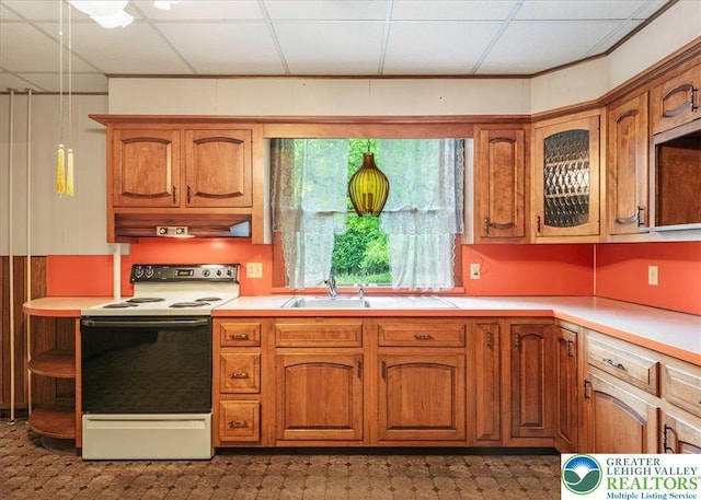 2834 Interchange Rd, Franklin Twp, PA 18235 - kitchen with electric stove, under cabinet range hood, light countertops, and brown cabinets