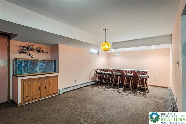 2834 Interchange Rd, Franklin Twp, PA 18235 - dining space featuring a dry bar, carpet flooring, and a baseboard radiator