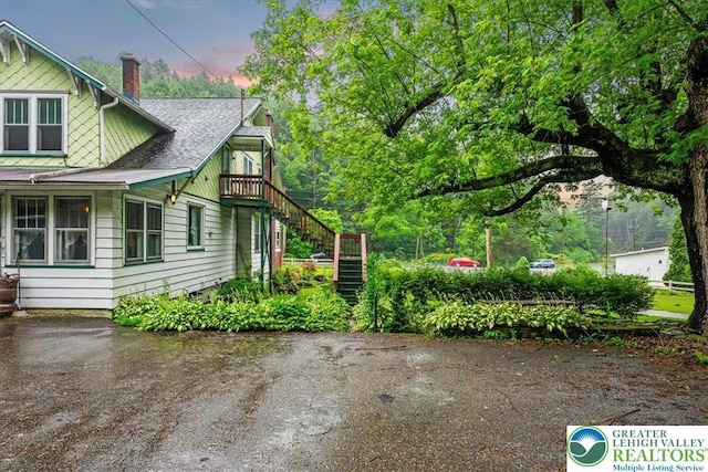 2834 Interchange Rd, Franklin Twp, PA 18235 - view of property exterior with stairway and a chimney