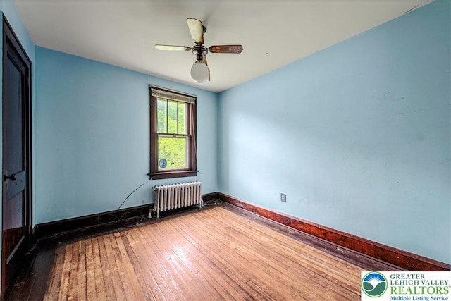 2834 Interchange Rd, Franklin Twp, PA 18235 - empty room featuring radiator, hardwood / wood-style floors, and ceiling fan