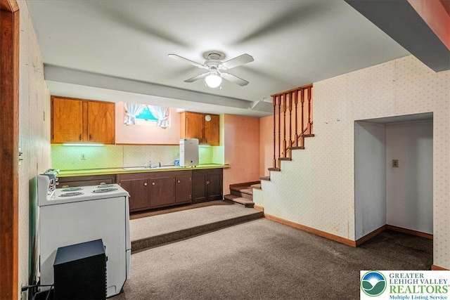 2834 Interchange Rd, Franklin Twp, PA 18235 - kitchen featuring electric range, ceiling fan, carpet, and brown cabinets