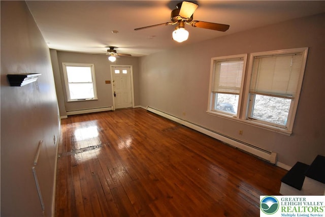 817 Ridge St, Easton, PA 18042 - unfurnished living room with a baseboard heating unit, a ceiling fan, and hardwood / wood-style flooring