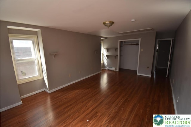 817 Ridge St, Easton, PA 18042 - unfurnished bedroom featuring baseboard heating, wood finished floors, and a closet