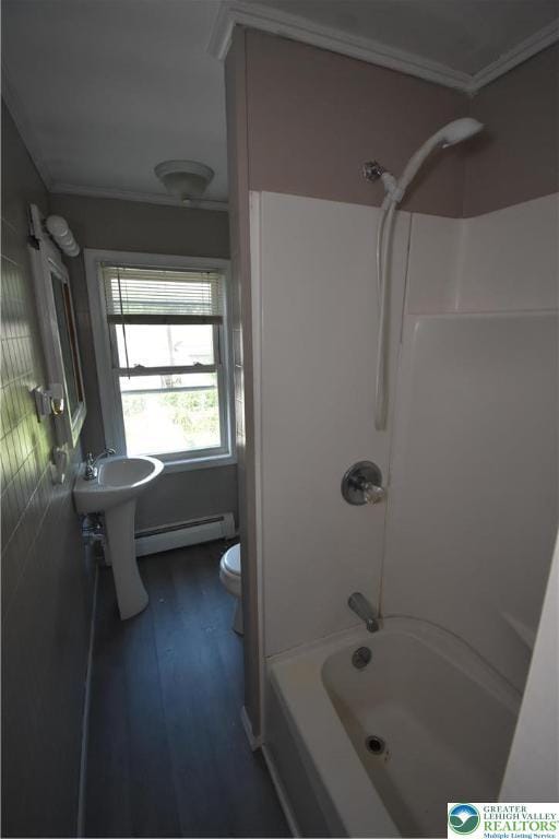 817 Ridge St, Easton, PA 18042 - bathroom featuring crown molding, a baseboard radiator, washtub / shower combination, and wood finished floors
