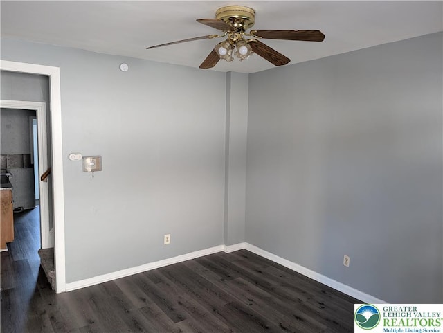 331 N Penn St, Allentown City, PA 18102 - empty room featuring a ceiling fan, dark wood-type flooring, and a smoke detector