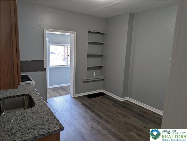 331 N Penn St, Allentown City, PA 18102 - unfurnished dining area featuring wood finished floors and baseboards