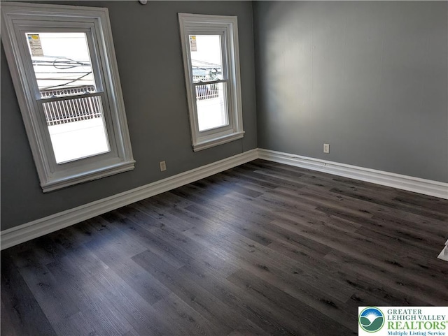 331 N Penn St, Allentown City, PA 18102 - spare room featuring baseboards and dark wood finished floors