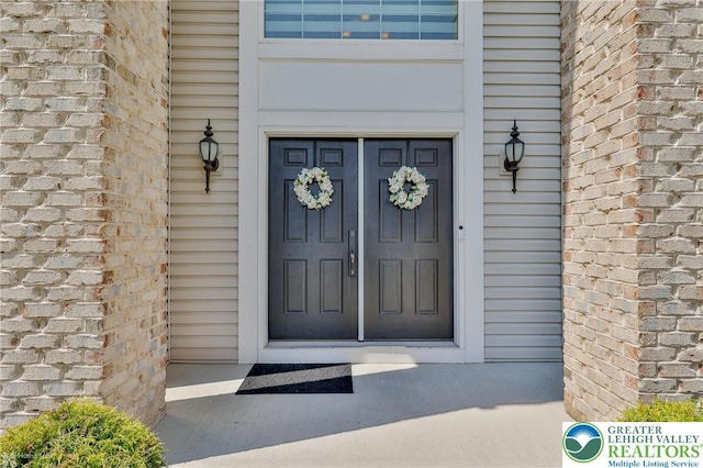 249 Danbury Dr, Upper Nazareth Twp, PA 18064 - view of exterior entry featuring brick siding