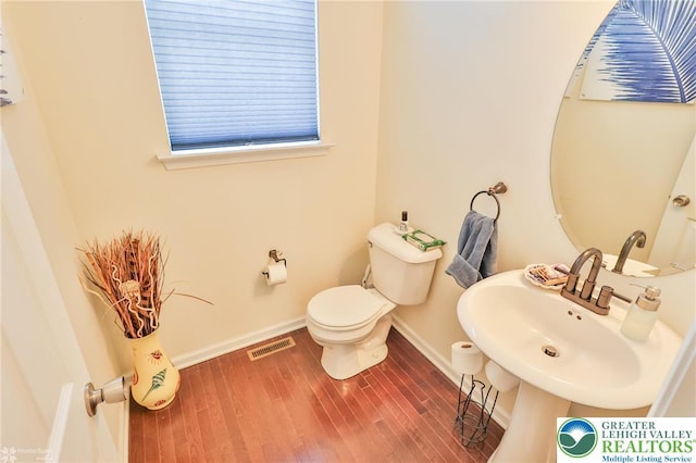 249 Danbury Dr, Upper Nazareth Twp, PA 18064 - bathroom featuring toilet and wood finished floors