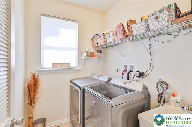 249 Danbury Dr, Upper Nazareth Twp, PA 18064 - laundry room with separate washer and dryer and baseboards