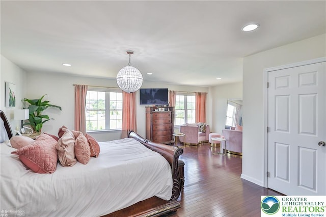 249 Danbury Dr, Upper Nazareth Twp, PA 18064 - bedroom featuring a chandelier, dark wood-style flooring, and recessed lighting